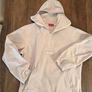 Cozy fleece with zip up hoodie. Two pockets and adjustable waist.